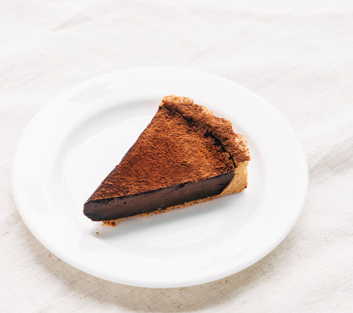 A cheesecake infused with Hsuan Mao's tea powder.