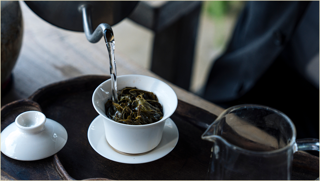 Water being poured into a tea cup.