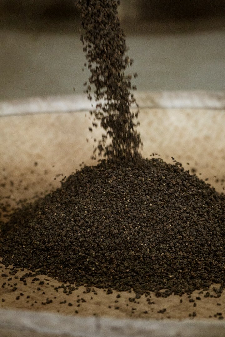 A close-up photo of dried tea leaves.