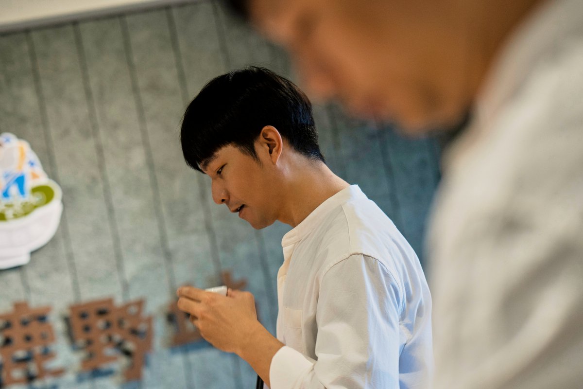 Team members tasting different batches of teas.
