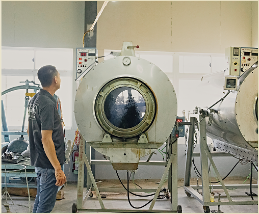 A man setting up the panning machine.