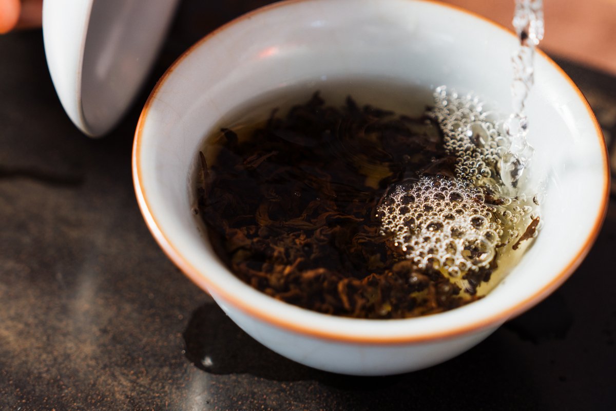 A close-up photo of bowl brewed Red Oolong tea.